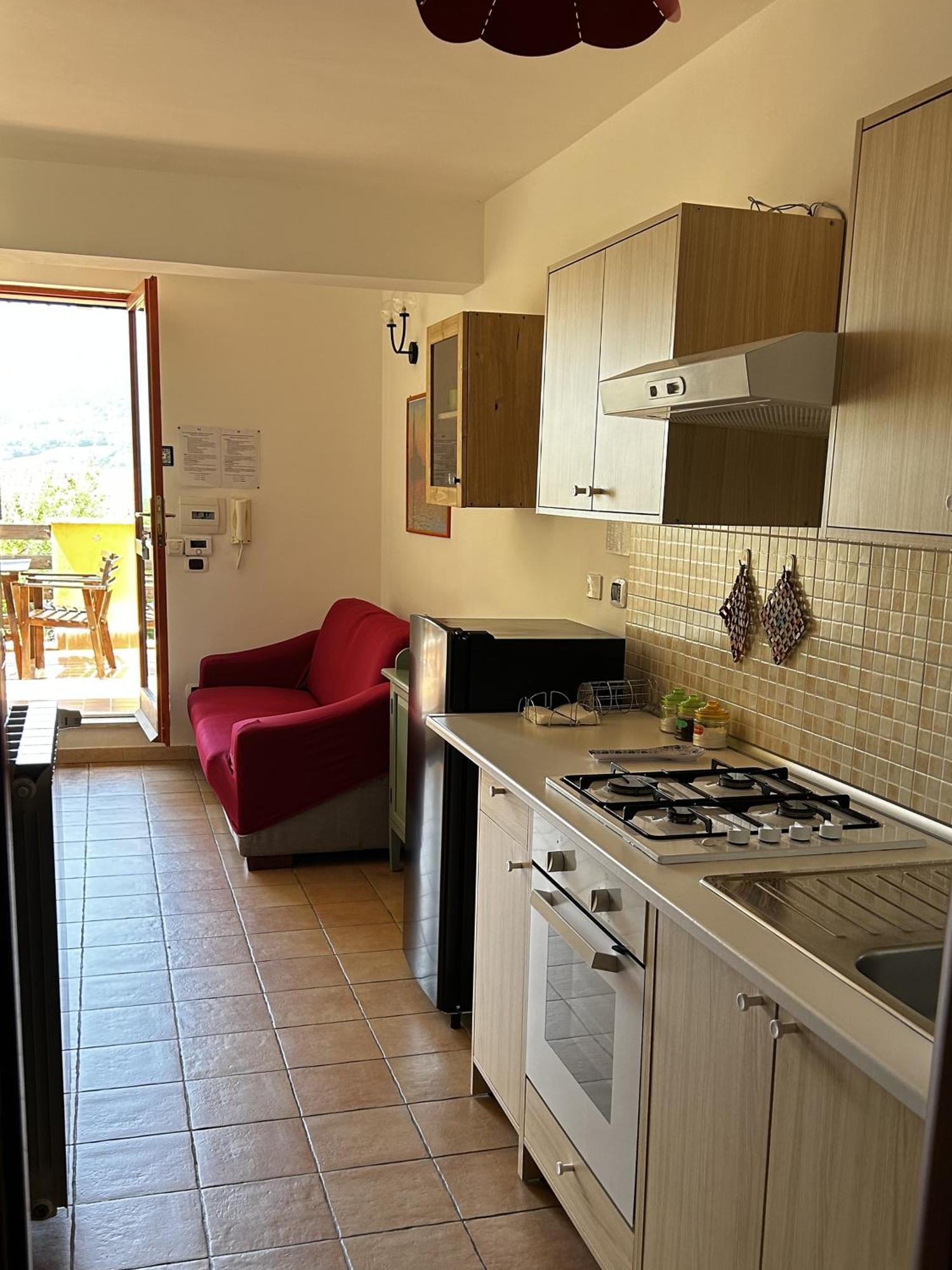 Апартаменты 4Flats In Orto Di Venanzio Барреа Номер фото